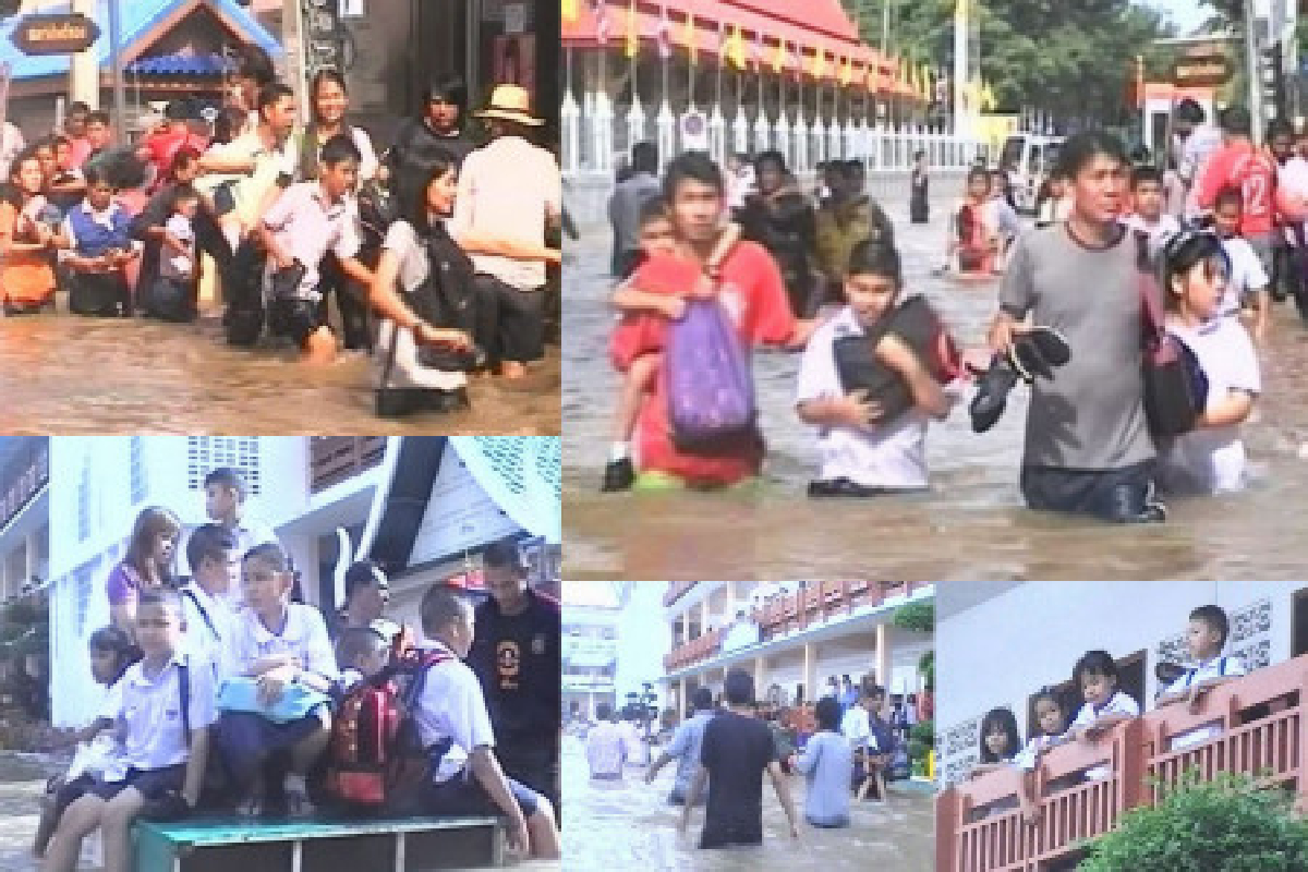 พนังกั้นพังน้ำทะลักอ่างทองนร.หนีโกลาหล พนังกั้นพังน้ำทะลักอ่างทองนร.หนีโกลาหล