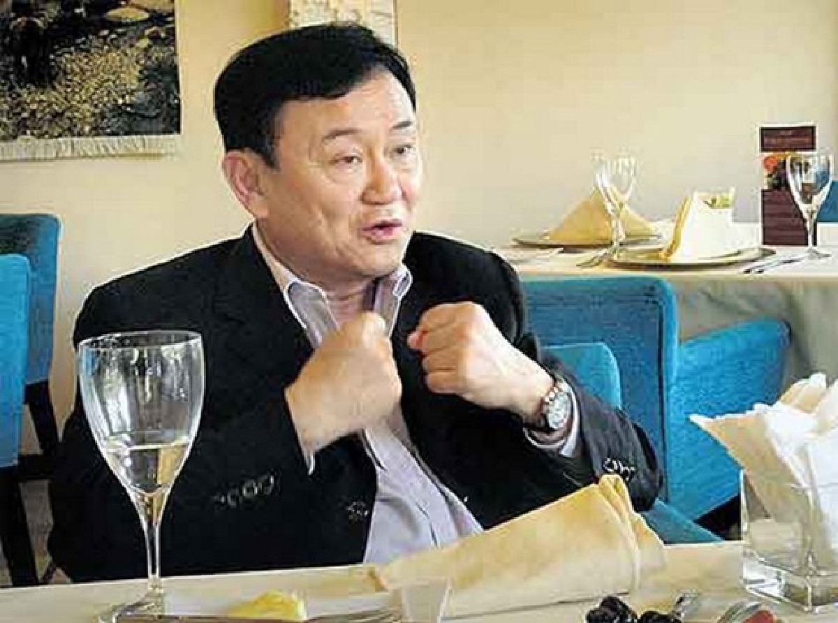 Thaksin talks, controversy follows