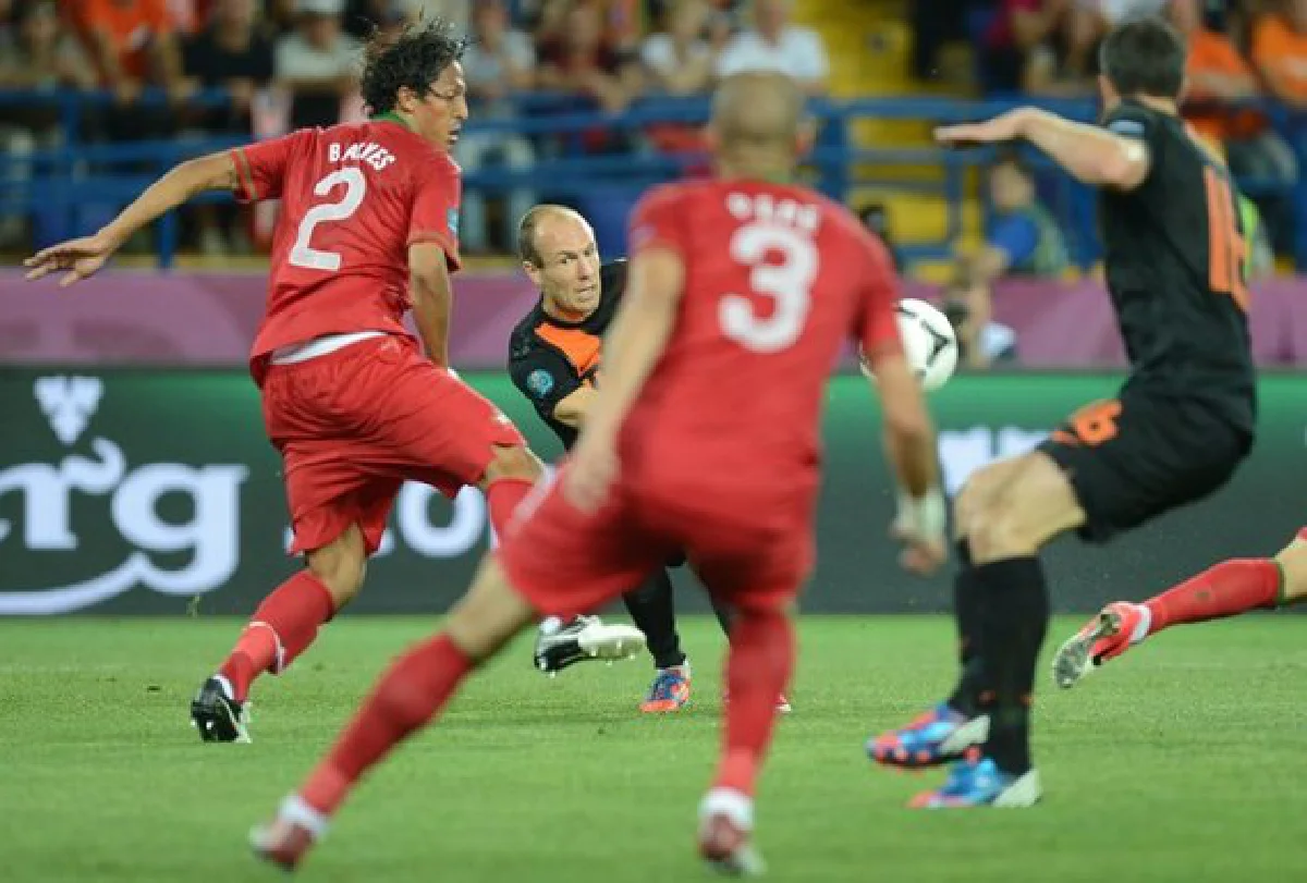 Euro 2012: Dutch horror show ends as   Portugal, Germany go through