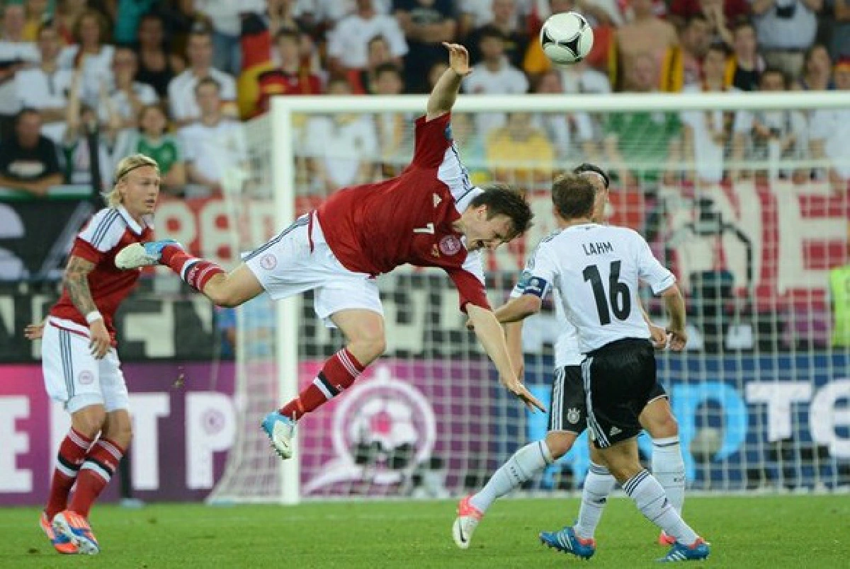 Euro 2012: Dutch horror show ends as   Portugal, Germany go through