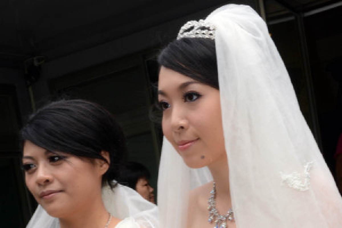 เลสเบี้ยนไต้หวันจัดพิธีแต่งงานแบบพุทธ เลสเบี้ยนไต้หวันจัดพิธีแต่งงานแบบพุทธ