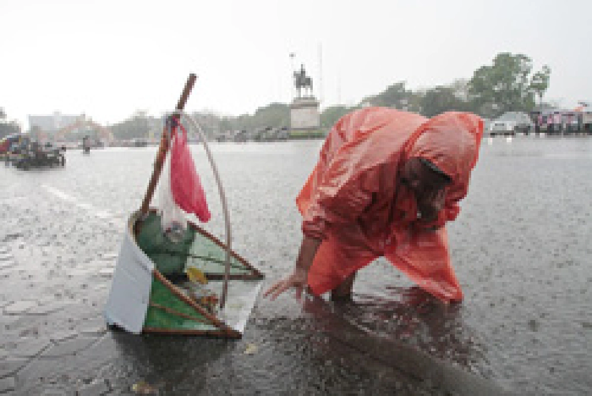 เรียนภาษาอังกฤษ จากมหาอุทกภัย “Thailand  submerged” “ประเทศไทยจมน้ำ”