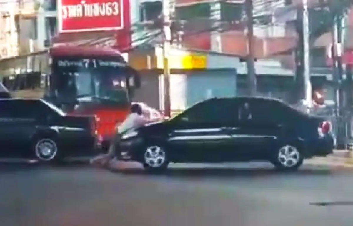 Woman gets dragged by car (video)