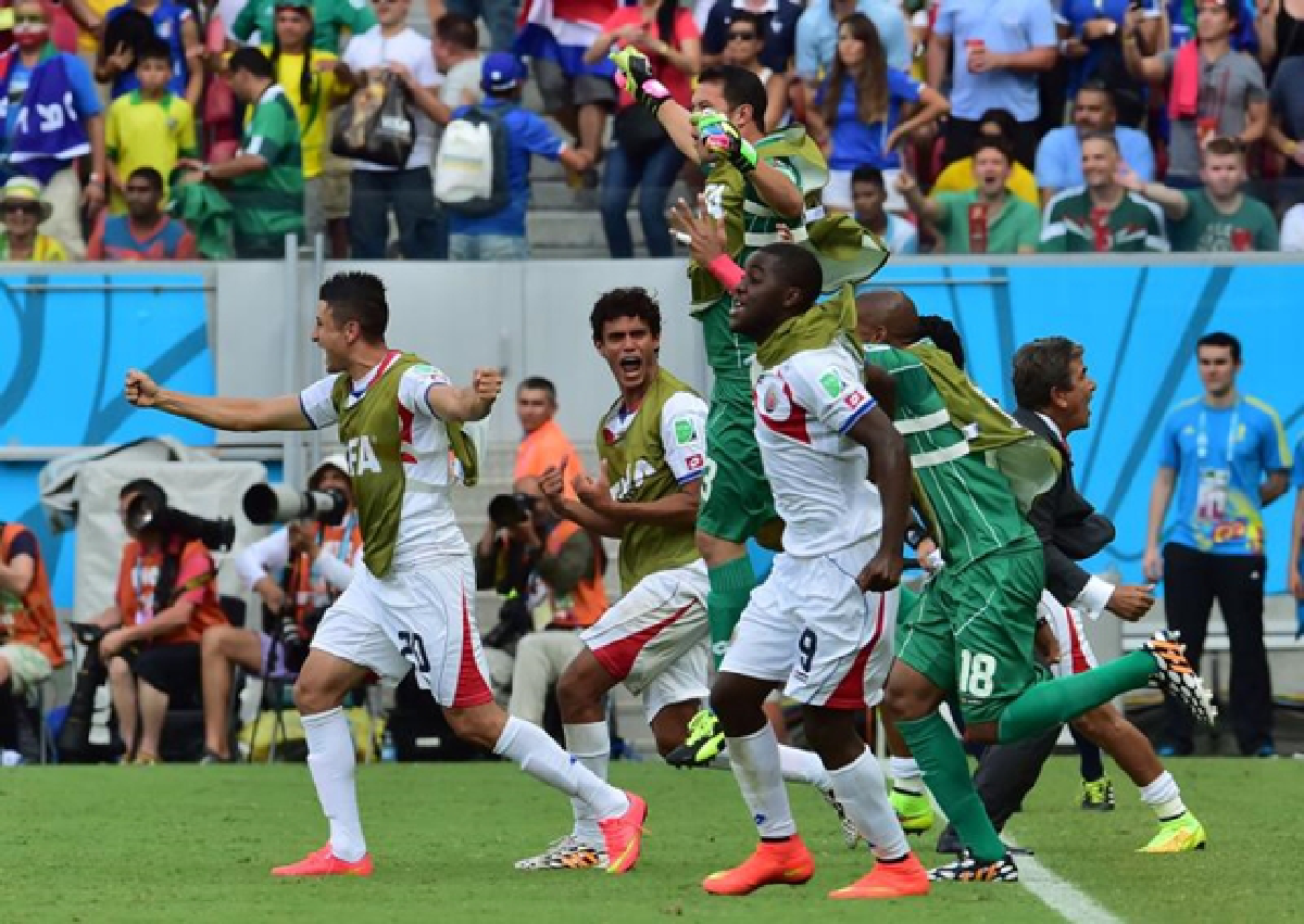 Costa Rica shocks Italy, France romps