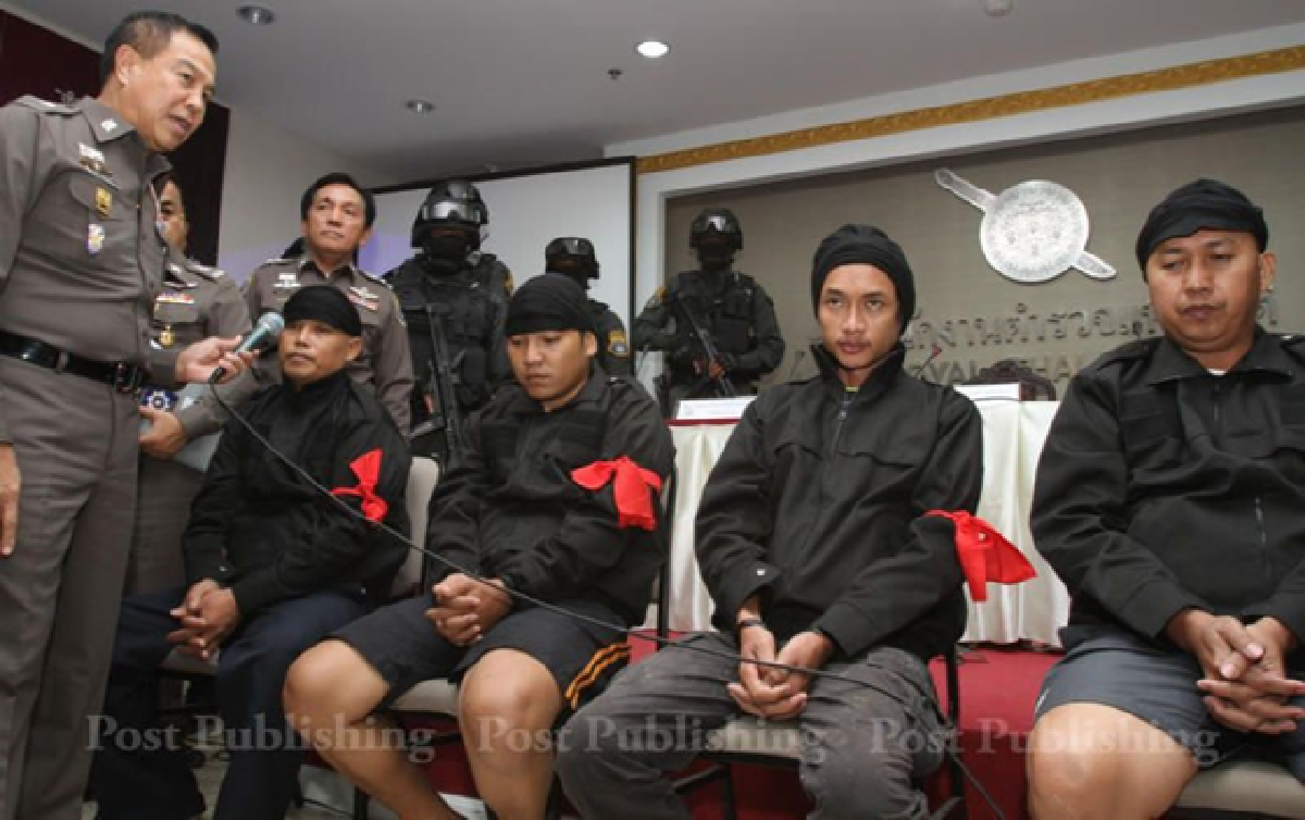 "Men in black" arrested, attack re-enacted (updated Saturday)