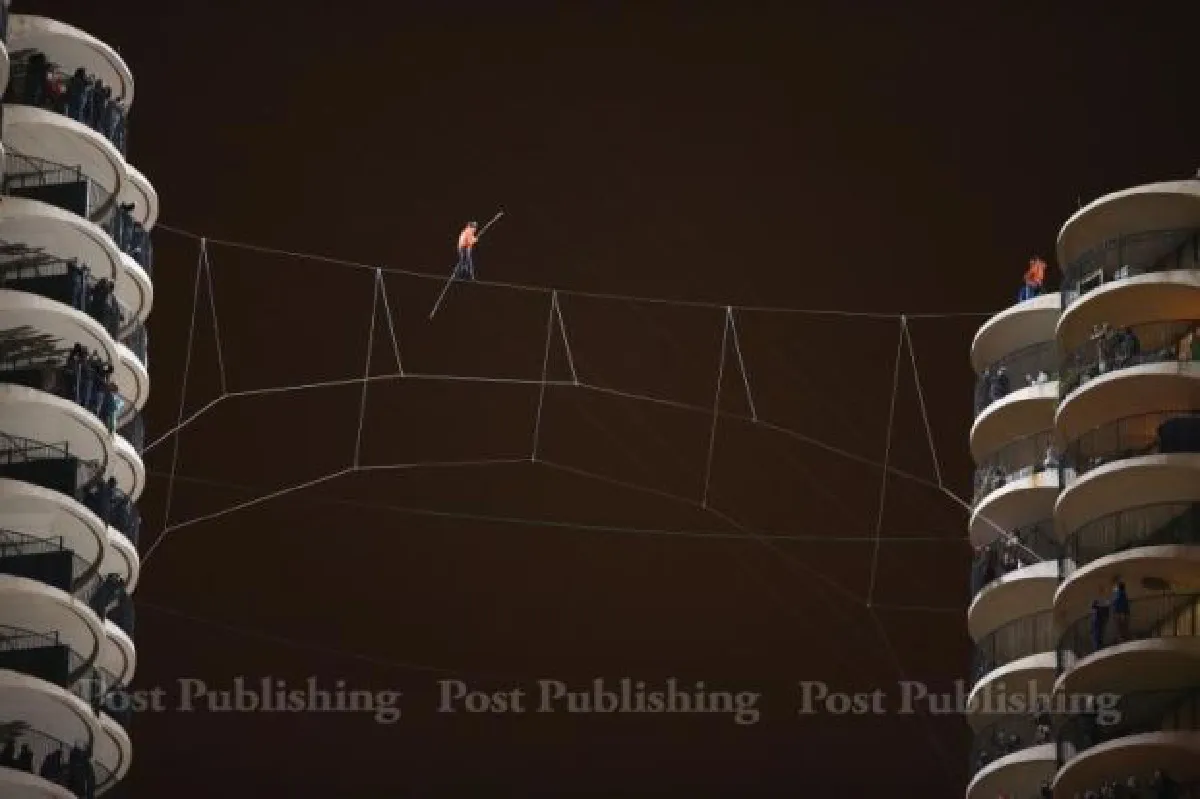 Tightrope walk blindfolded, high above Chicago streets (video)