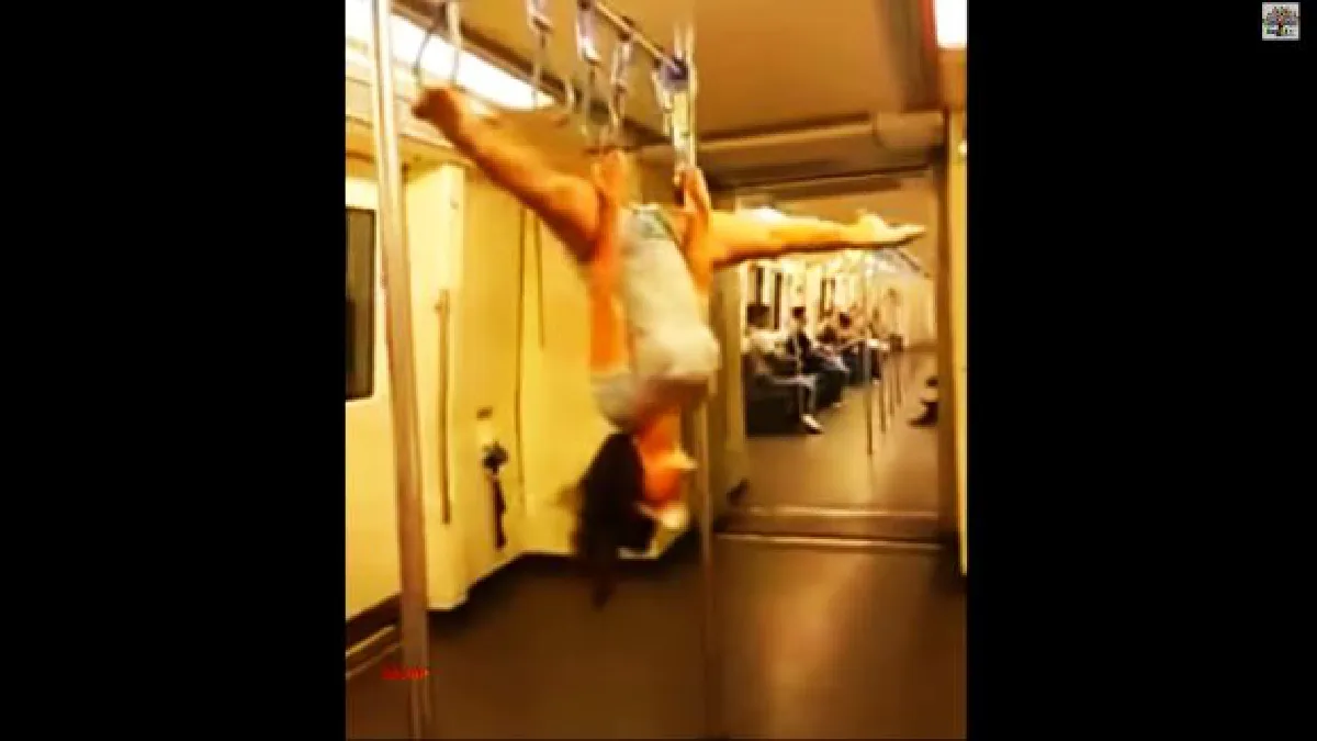 Pole dancing on Bangkok subway: Don't try it