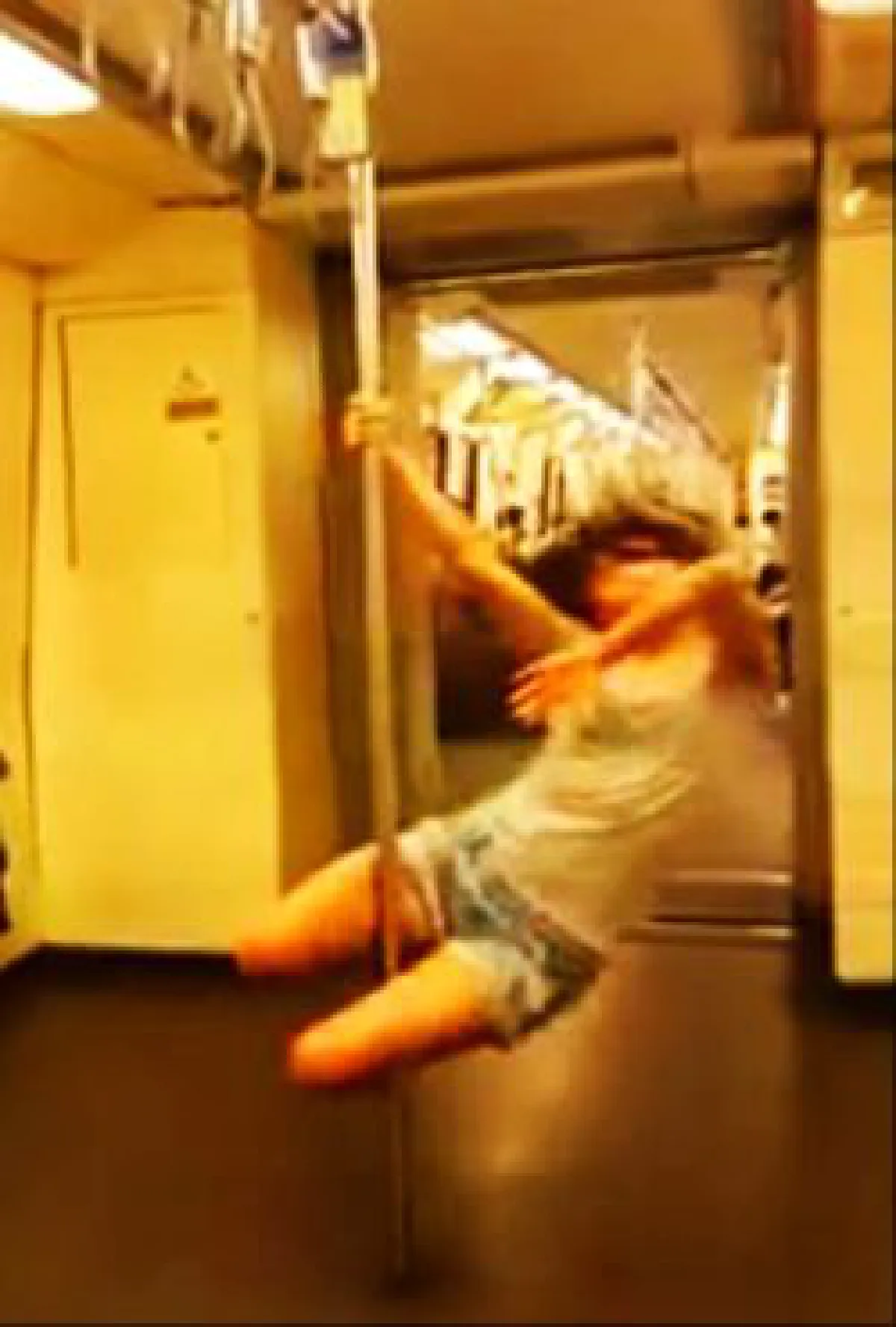 Pole dancing on Bangkok subway: Don't try it