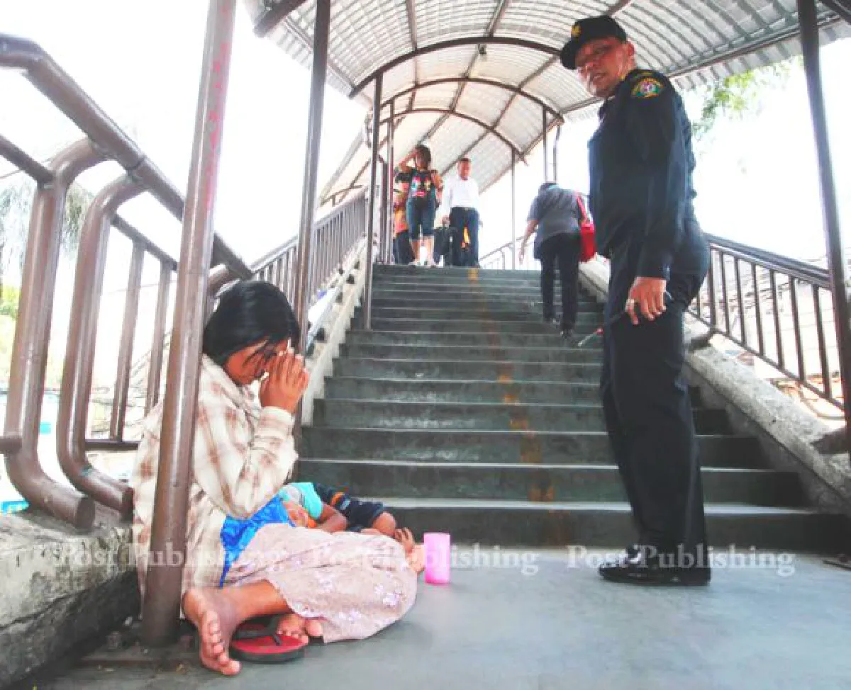 Begging paid school bills for her 4 children