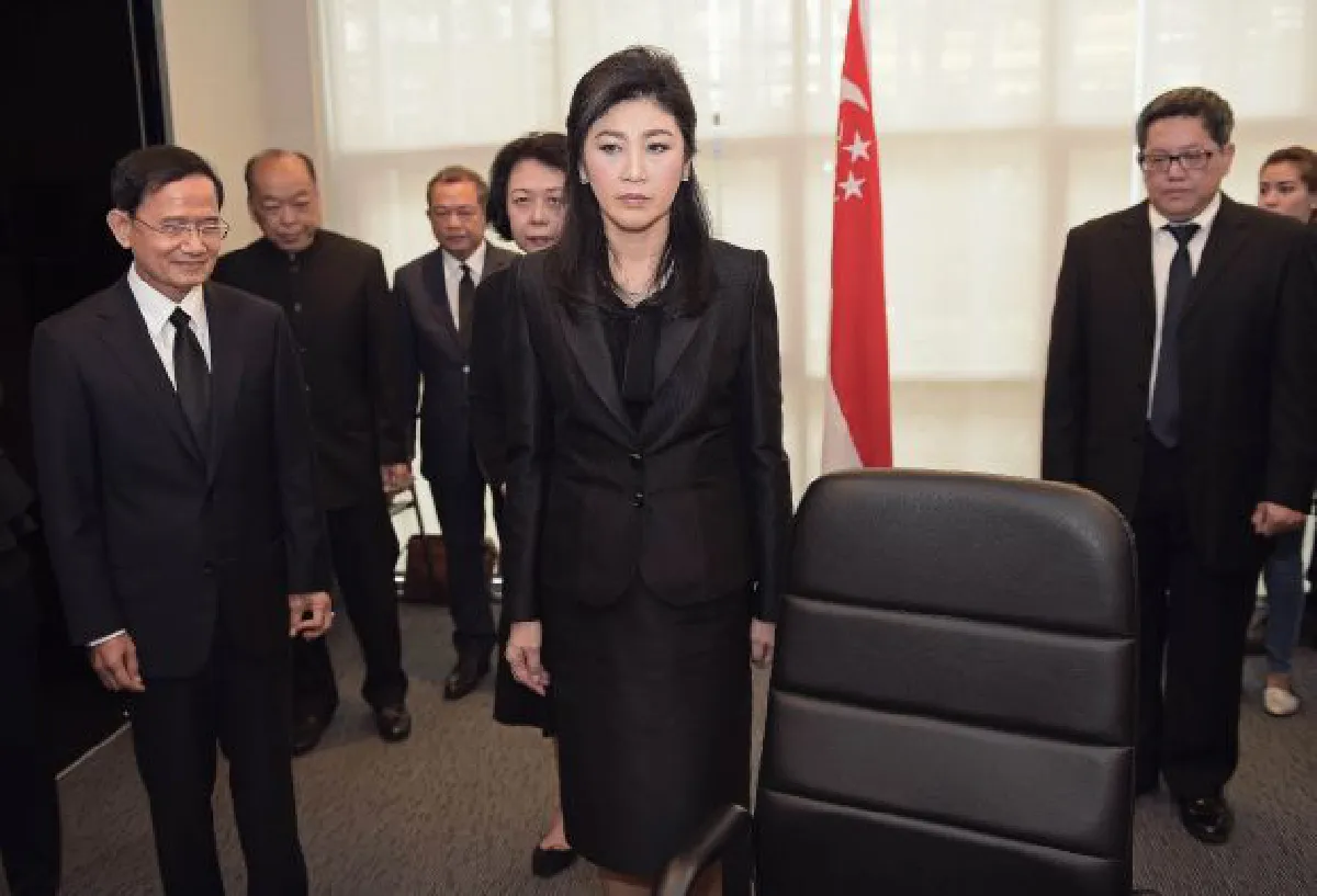 Thailand's Yingluck Shinawatra faces trial and political ruin