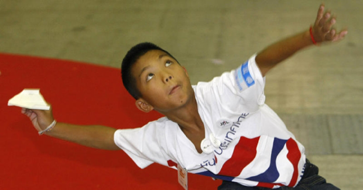 Paper airplane champ still stateless