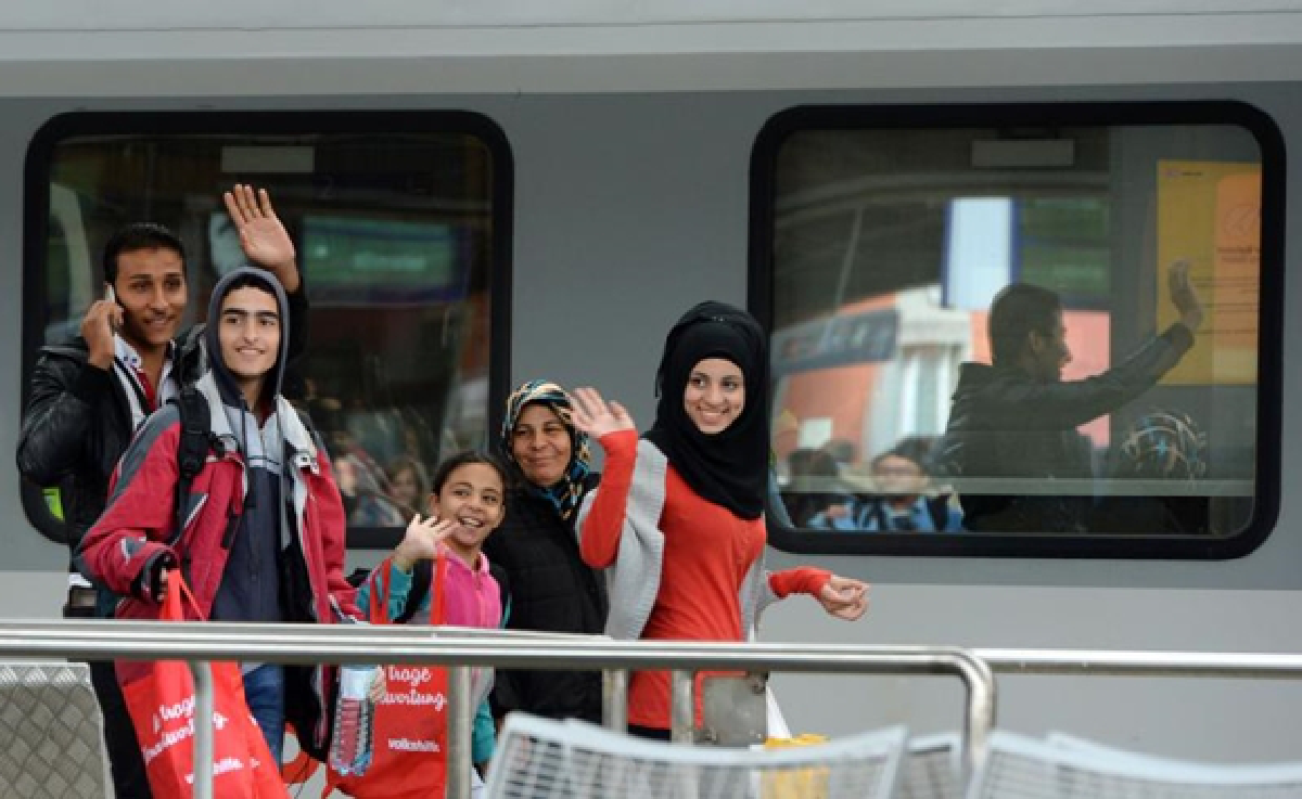 Warm welcome for refugees in Germany, but thousands still stranded.