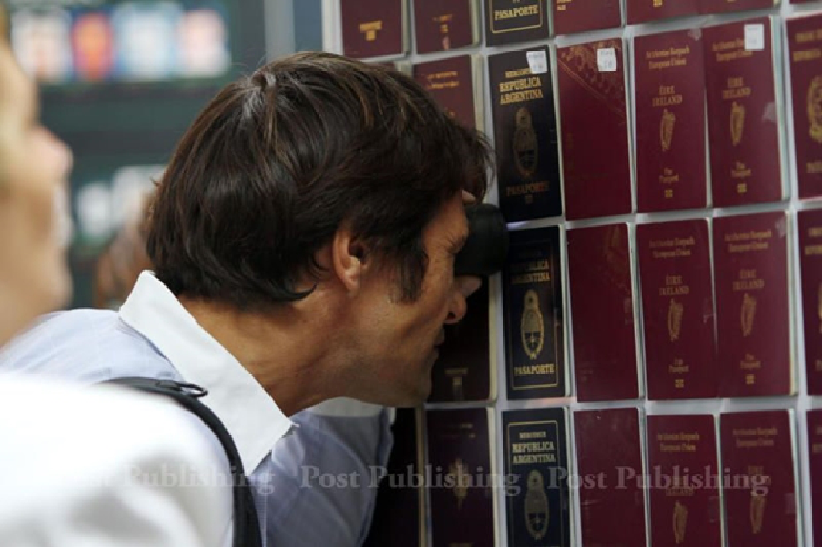 Passport ring: Pizza order leads to arrest