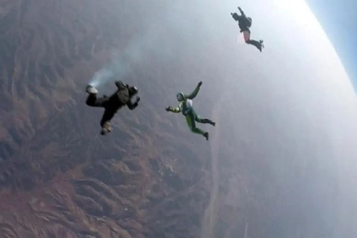 Skydiver first to jump and land without chute