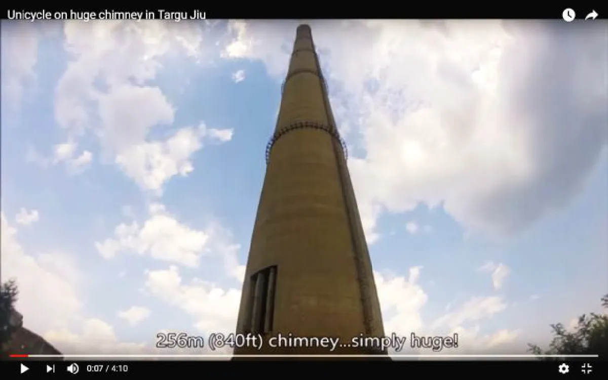 Romanian unicycles 250 meters off ground on edge of chimney