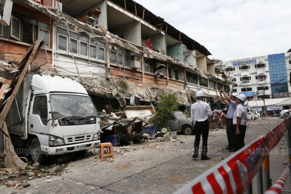 Unsafe shophouses collapse after residents refuse to leave