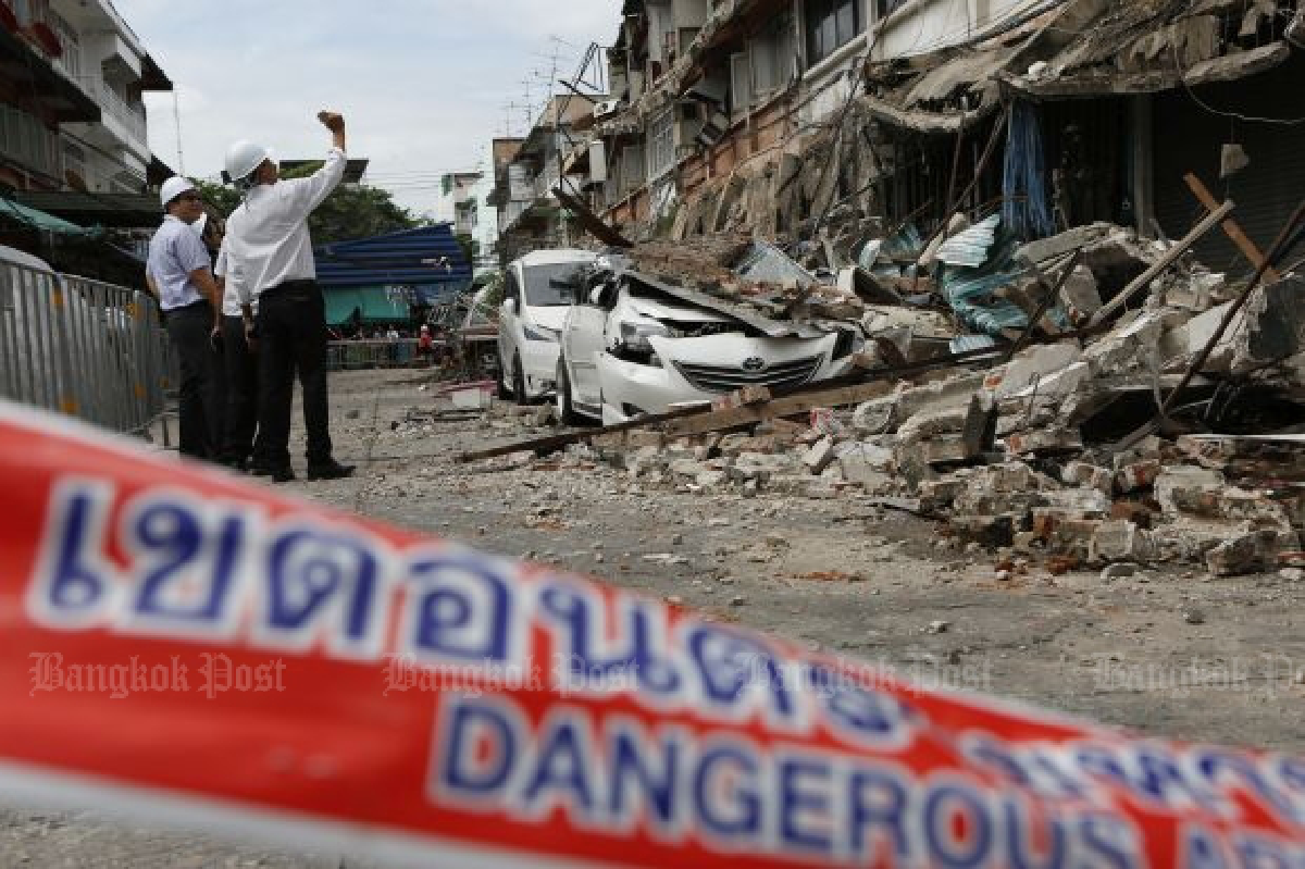 Unsafe shophouses collapse after residents refuse to leave