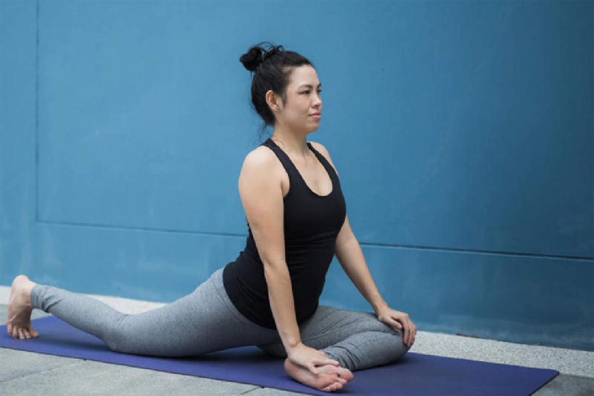 Pigeon with shoulder opener (Eka Pada Kapotasana variation)