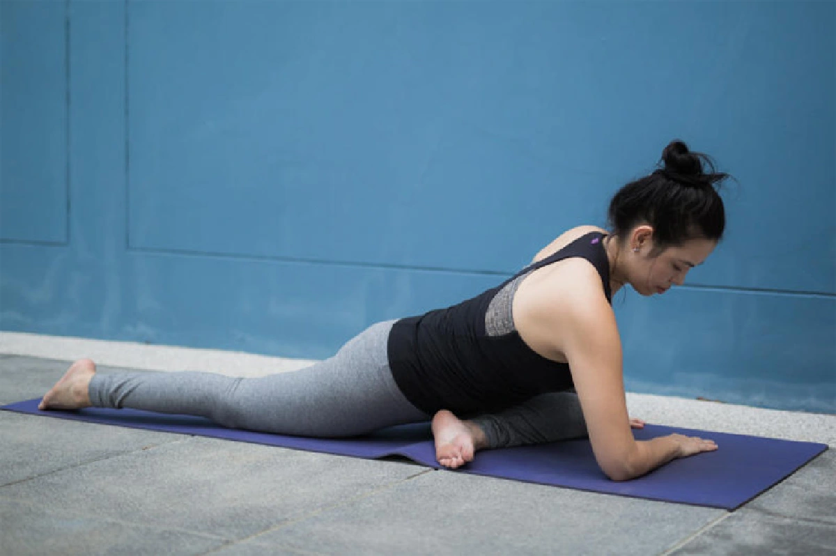 Pigeon with shoulder opener (Eka Pada Kapotasana variation)