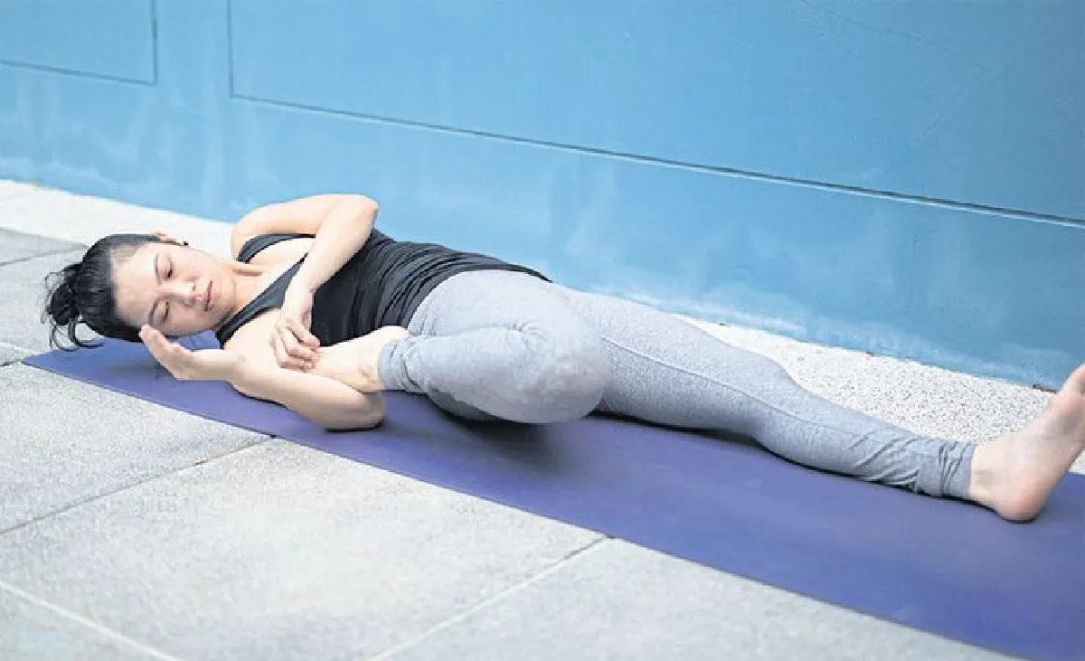 Ardha Supta Virakapotasana (Half Hero-Pigeon Pose)
