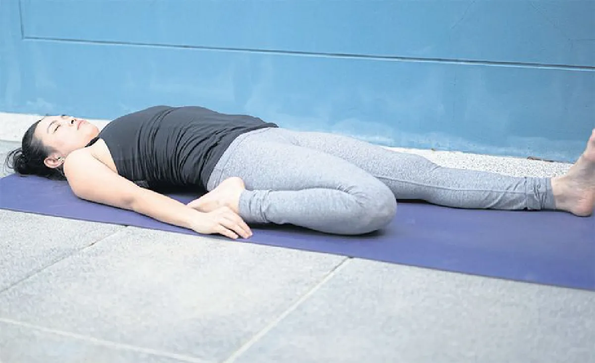 Ardha Supta Virakapotasana (Half Hero-Pigeon Pose)