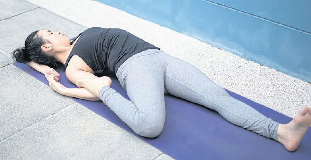 Ardha Supta Virakapotasana (Half Hero-Pigeon Pose)