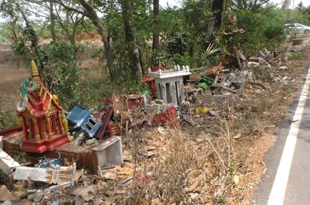 Unwanted spirit houses dumped by side of a road