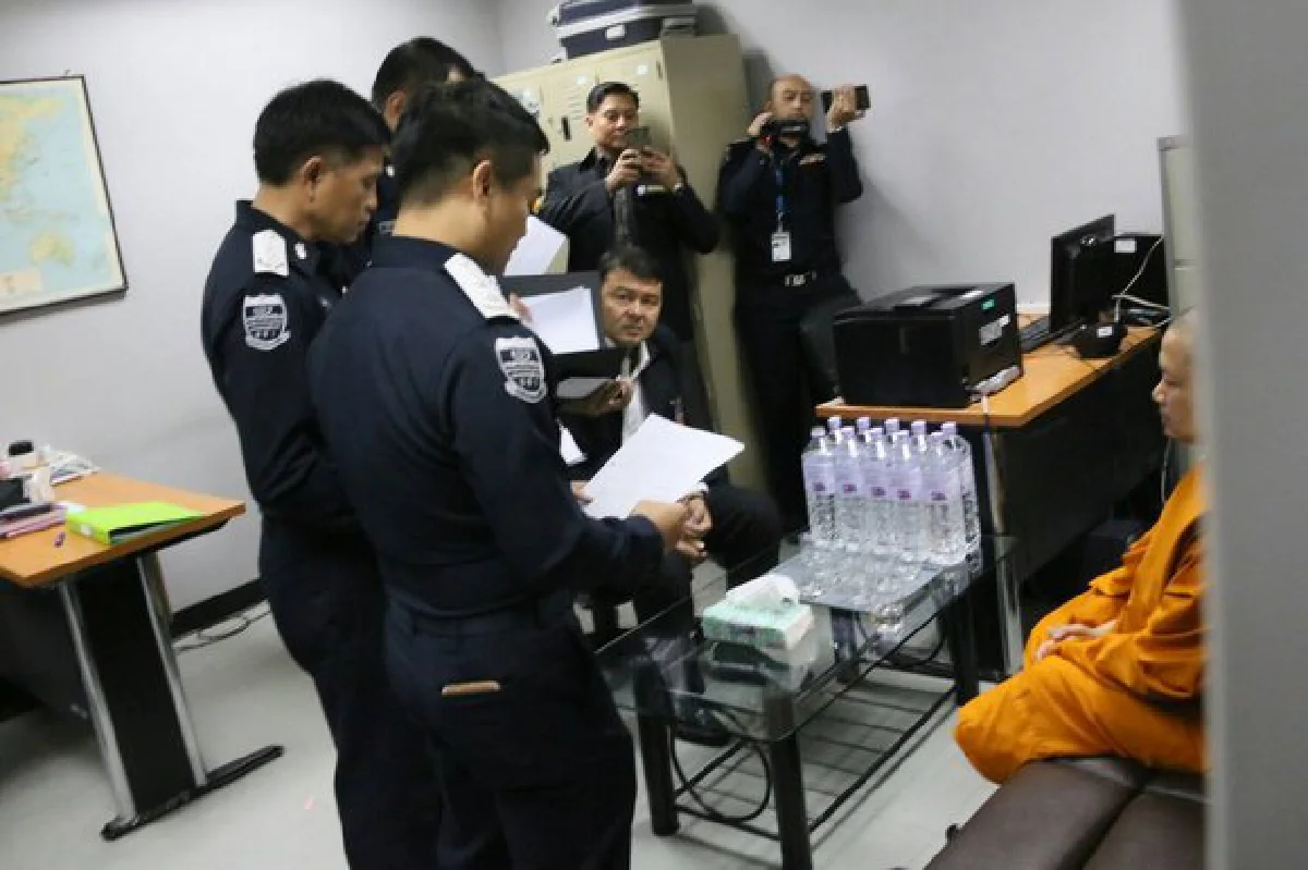 Disgraced monk arrives in Bangkok to face charges