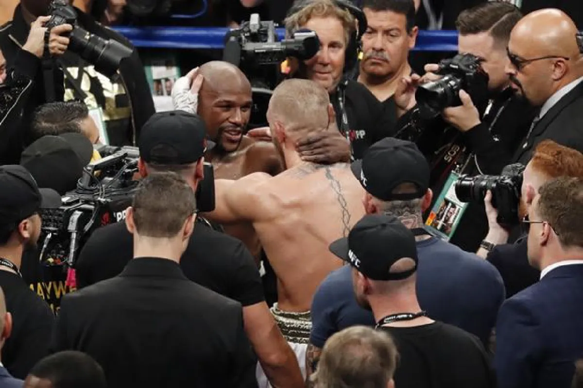 Mayweather stops brave McGregor in 10th