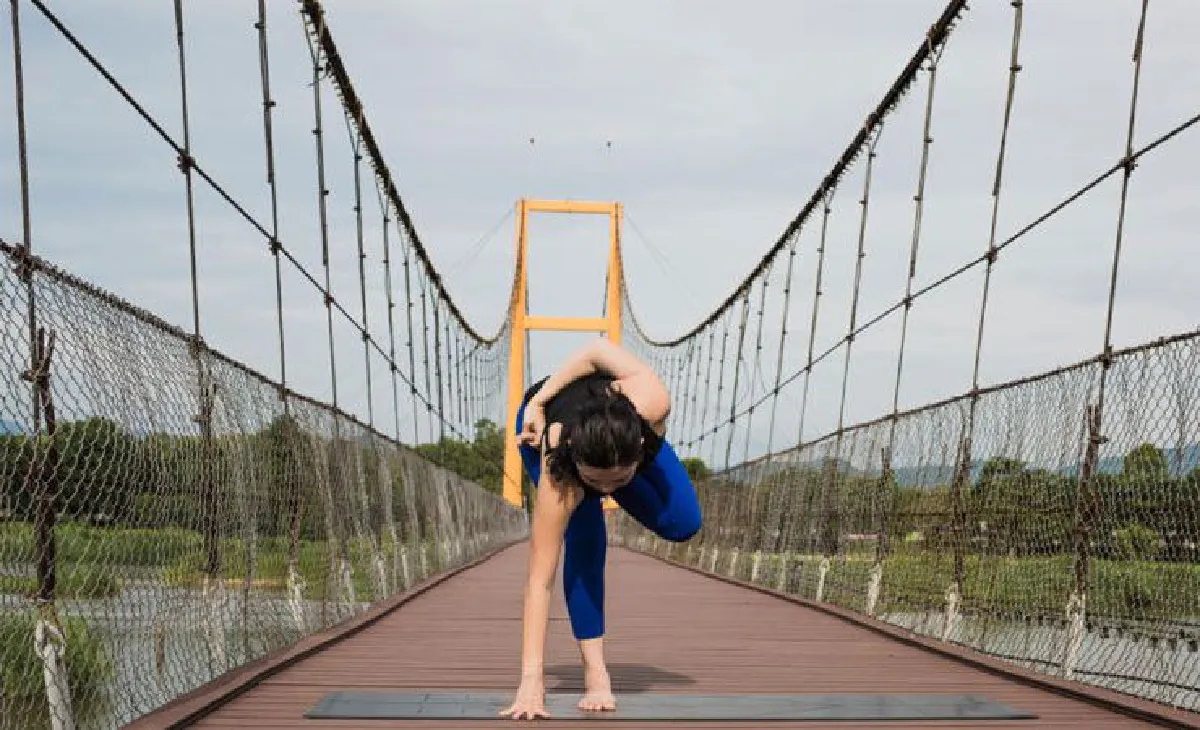 Ardha Baddha Padmottanasana (Half Bound Lotus Standing Forward Bend)