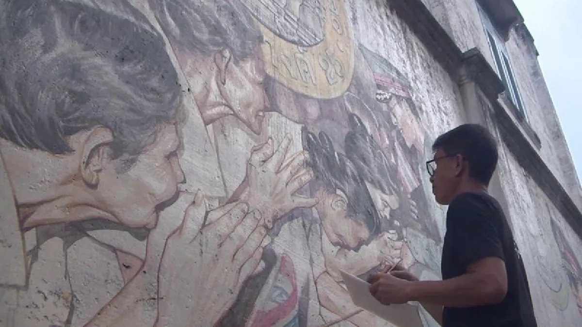 ชมภาพวาดบนกำแพงเก่าเล่าเรื่องร.9เสด็จเมืองนคร