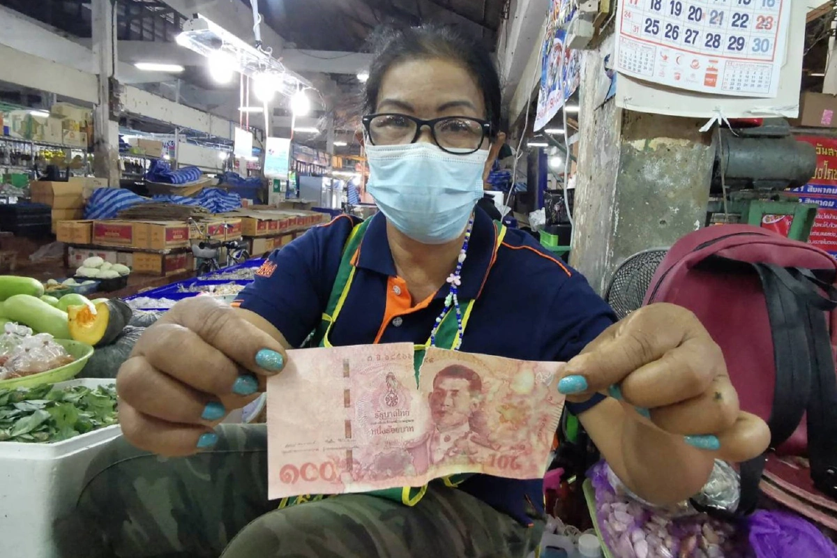ผู้ค้าตลาดสดบุรีรัมย์ผวาแบงค์100ปลอมระบาด