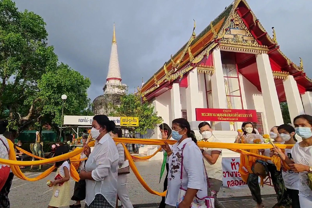 บรรยากาศแห่ผ้าขึ้้นธาตุเมืองนครศรีฯ วันมาฆาบูชา ท่ามกลางการคุมโควิดเข้ม